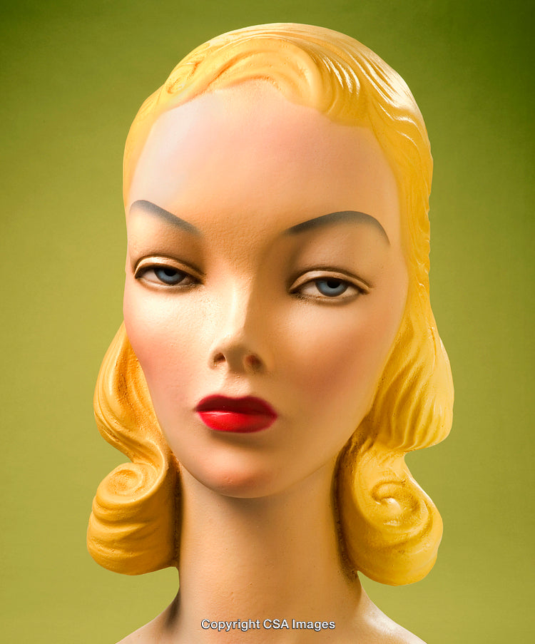 Retro Style Female Mannequin Display Head with Deep Expression on Green Background