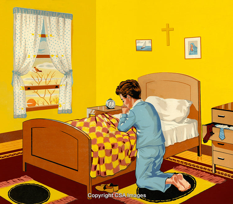 Young Boy Kneeling in Prayer by Bed in Cozy Bedroom Setting