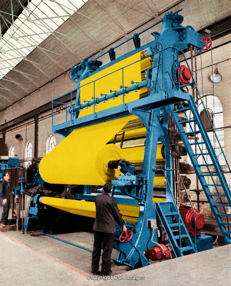 Large Industrial Machine Producing Bright Yellow Fabric Inside a Factory Setting