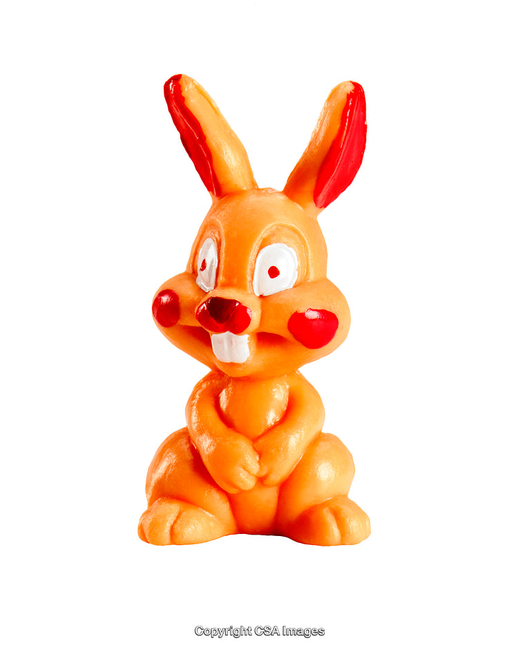 Brightly Colored Plastic Bunny Figurine With Wide Smile and Large Red Cheeks