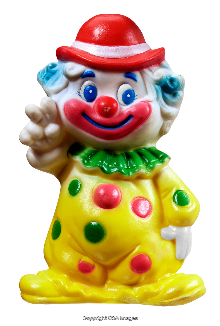 Colorful Clown Figurine with Red Hat and Polka Dot Outfit on White Background