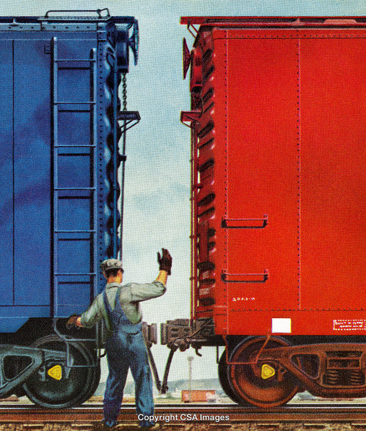 Train Worker Guiding Railway Cars for Connection on a Sunny Day