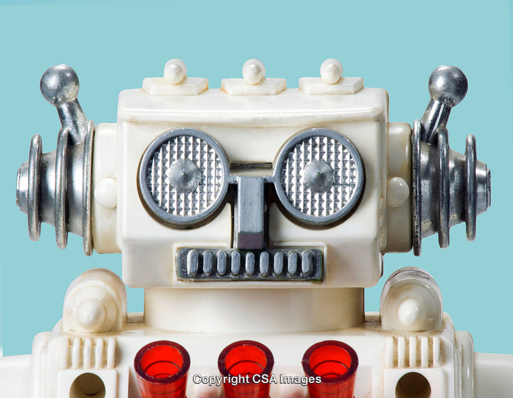 Close-Up of a Retro Toy Robot with a Blue Background