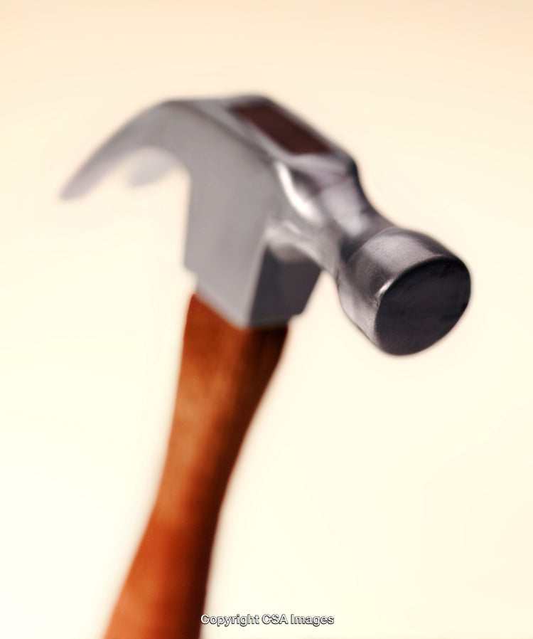 Close-up View of a Toy Hammer with Wooden Handle