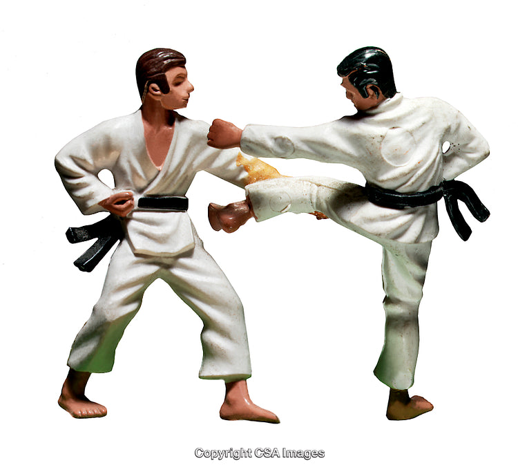 Two Figurines Depicting Martial Artists Engaging in a Karate Match