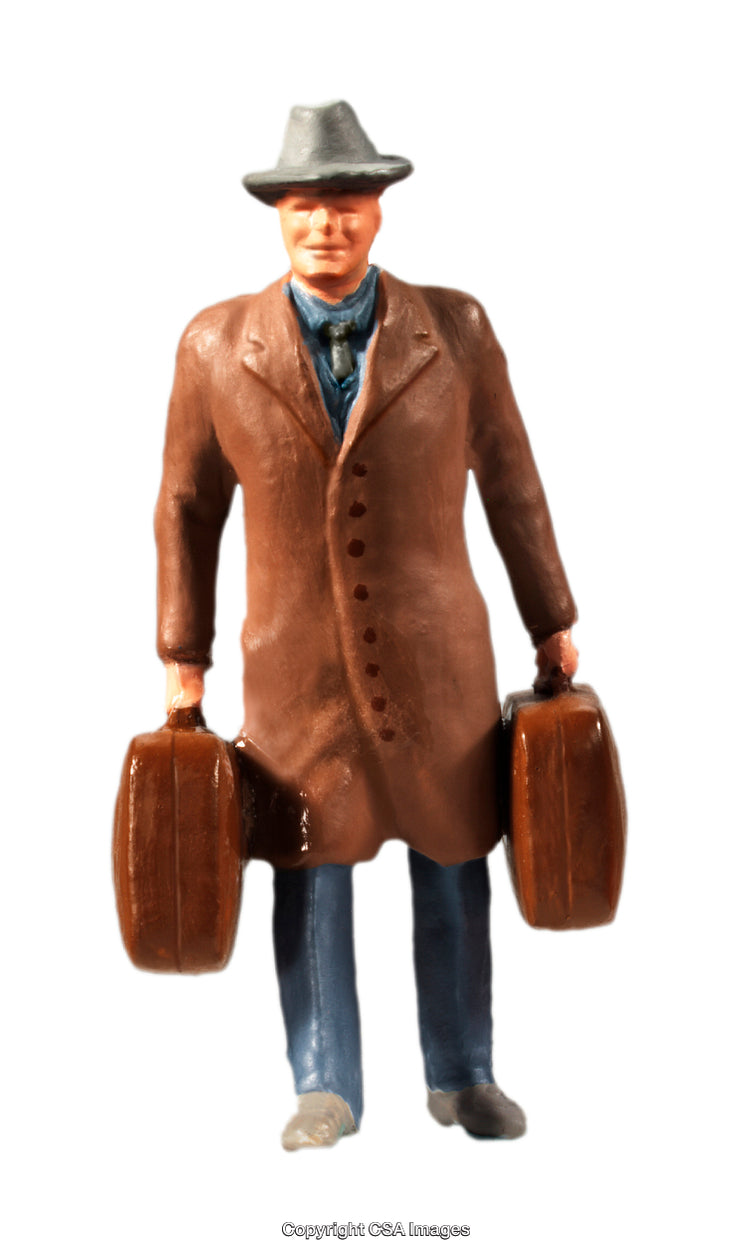 Vintage Toy Figure Representing a Traveler Carrying Suitcases