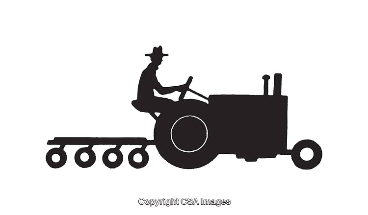 Silhouette of a Farmer Driving a Tractor with Equipment Attached
