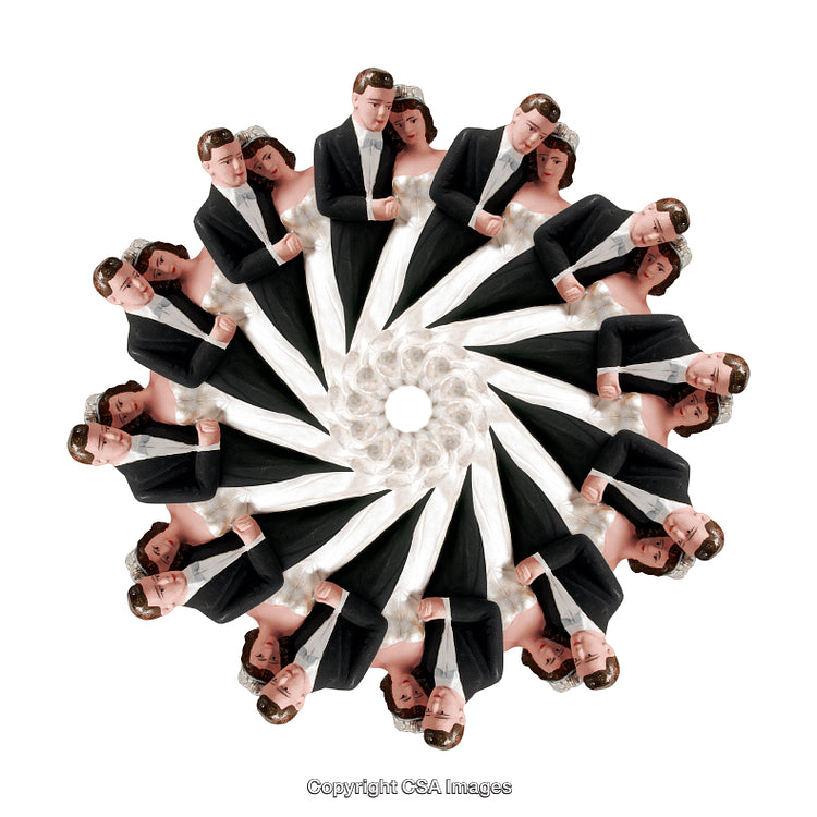 Spiral Composition Featuring Bride and Groom Figurines on White Background
