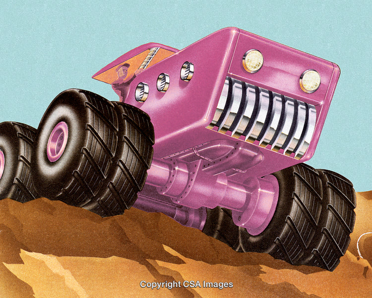 Colorful Monster Truck Traveling Off-Road on Rugged Terrain