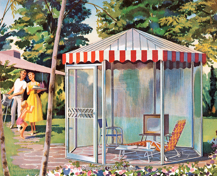 Family Enjoying a Backyard Meal Near a Vibrant Screen Room Retreat
