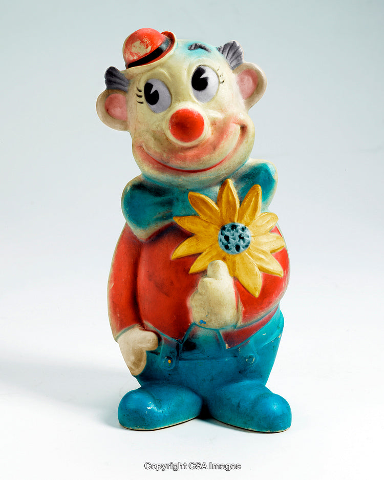 Colorful Vintage Plastic Clown Toy Figurine Holding a Yellow Flower