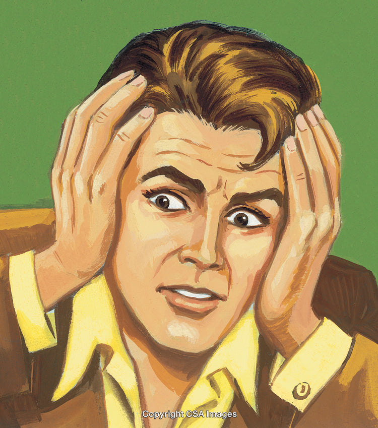 Shocked Man Holding His Head With Both Hands in Anxiety