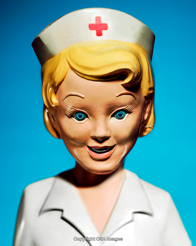 Close-Up of a Nurse Figurine in White Uniform on Bright Blue Background