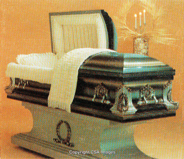 Elegant Open Casket with Ornate Details and Soft Ambient Lighting