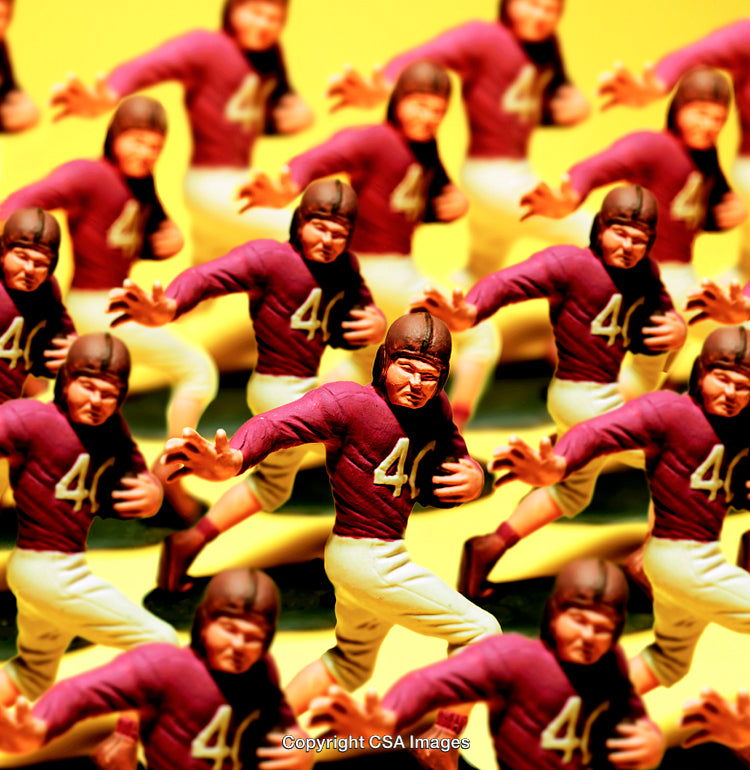 Collection of Vintage Football Player Figures in Action Poses on Yellow Background