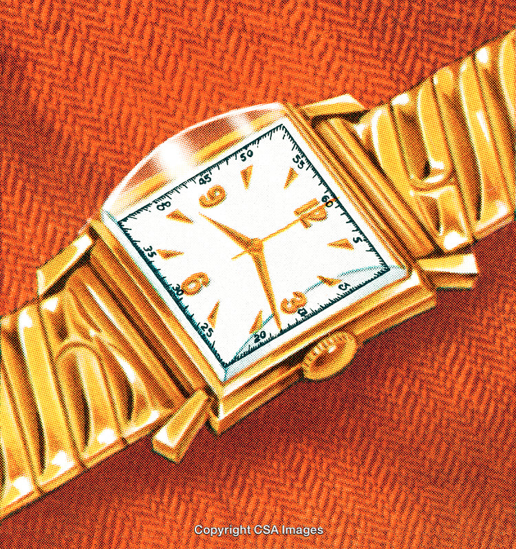 Golden Wristwatch Against Bold Vibrant Orange Cloth Background Design