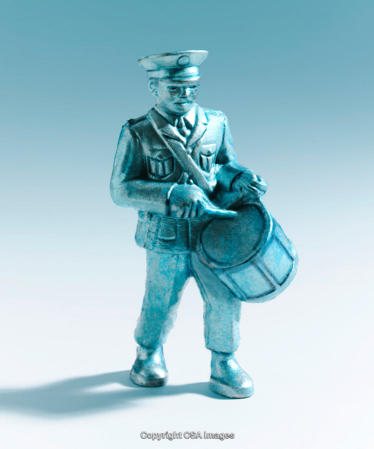 Metallic Blue Soldier Figurine Playing a Drum in a Minimalistic Setting