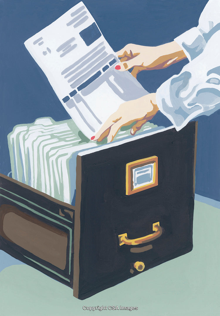 Hands Filing Important Papers Into an Organized Storage Drawer