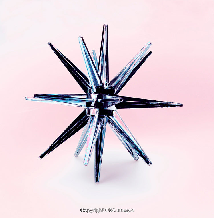 Transparent Geometric Sculpture Against a Soft Pink Backdrop