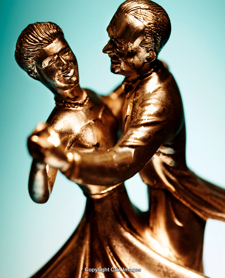 Close-Up of a Bronze Couple Figurine Performing a Dance Pose