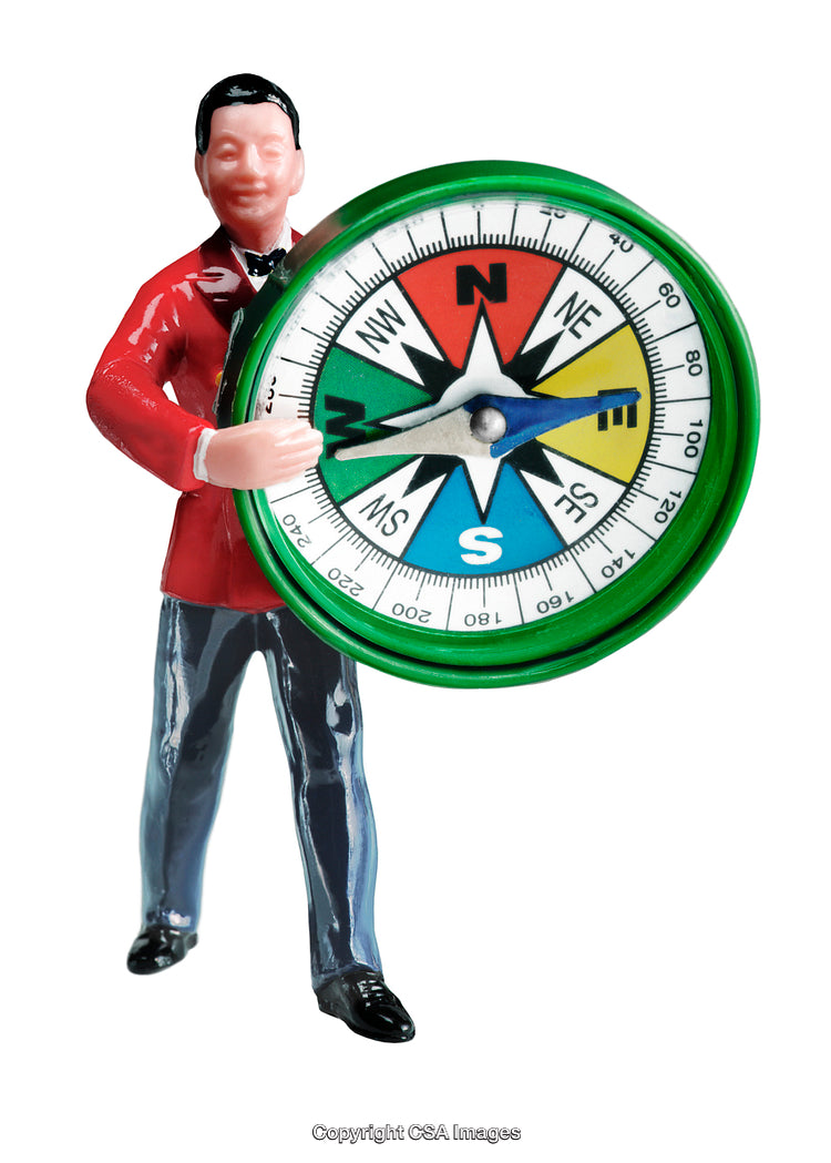 Colorful Toy Figure Holding a Large Compass with Green Frame