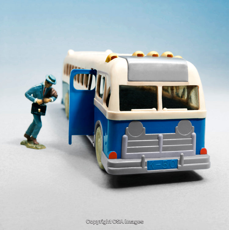 Miniature Bus and Figure Depicting Classic Transportation Scene