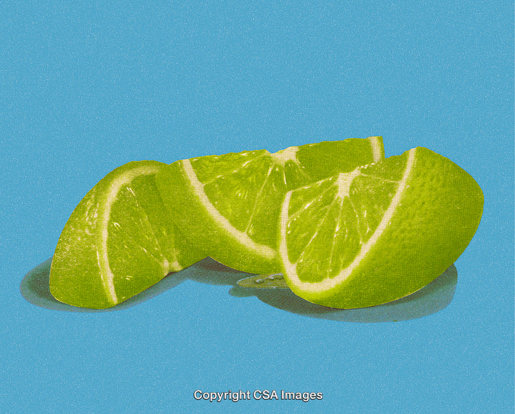 Close-Up of Vibrant Lime Slices Against a Bright Blue Background