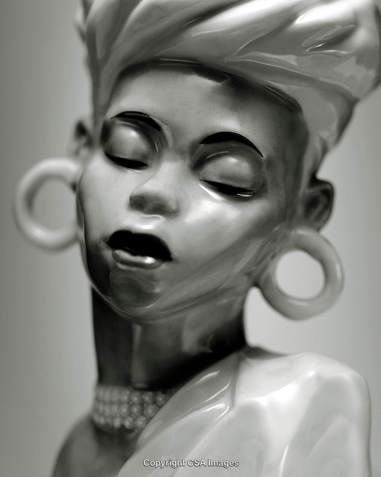 Elegant Ceramic Figurine with Smooth Features and Unique Design