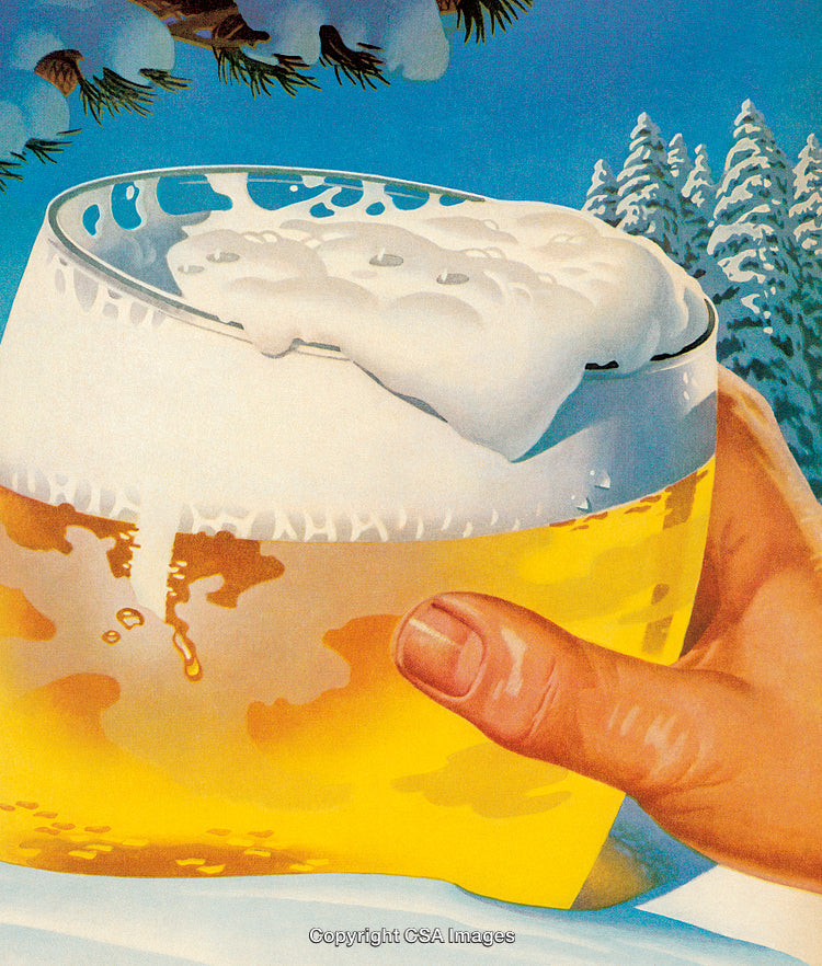 Hand Holding a Beer Glass in a Winter Wonderland Setting
