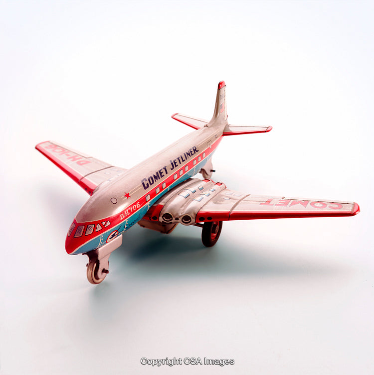 Vintage Tin Toy Airplane with Comet Jetliner Design and Red Accents