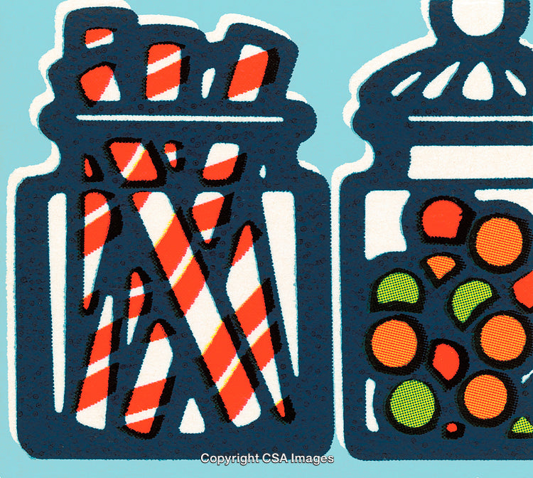 Colorful Candy Jars Featuring Striped Sticks and Vibrant Spherical Sweets