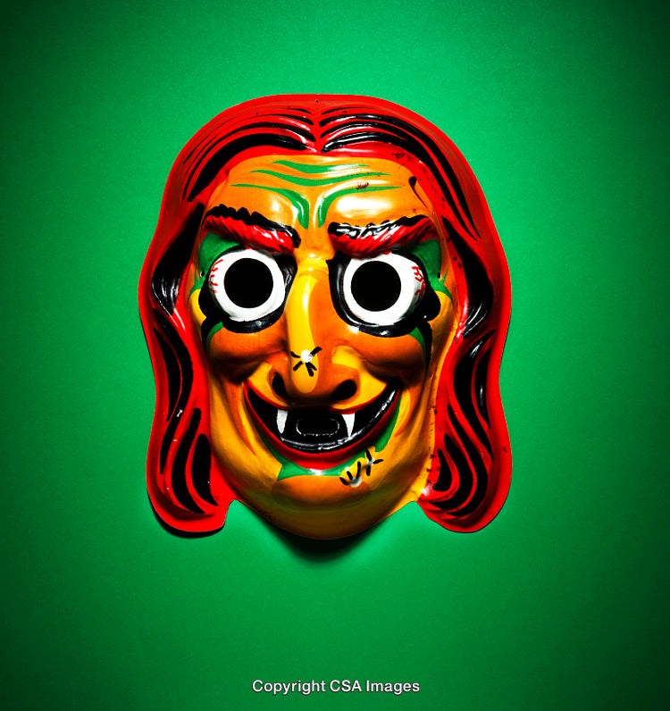 Colorful Decorative Mask Against a Vibrant Green Background
