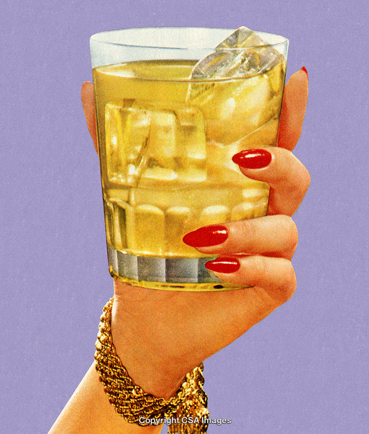 Stylish Female Hand Holding Whiskey Glass with Ice on a Vibrant Background