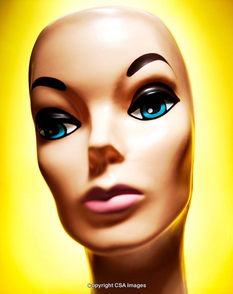 Stylized Close-Up of a Mannequin Face on Yellow Background