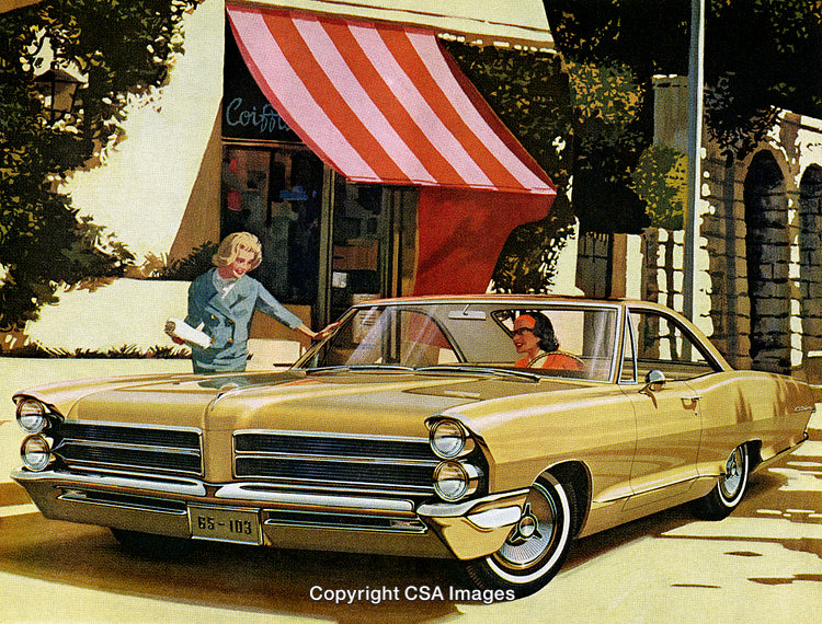 Classic Golden Car Parked Near Boutique with Retro Charm in Urban Setting