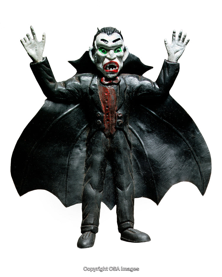 Spooky Vampire Figure with Detailed Cape and Green Eyes in Dramatic Pose