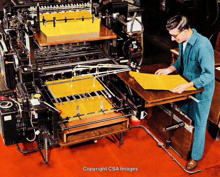 Worker Operating a Printing Machine in a Retro Industrial Setting
