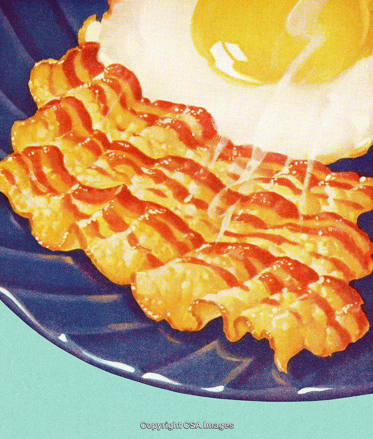 Delicious Breakfast Plate Featuring Crispy Bacon and Sunny-Side-Up Egg
