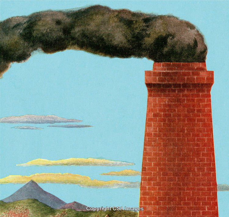 Industrial Chimney Emitting Smoke Against a Scenic Blue Sky Landscape
