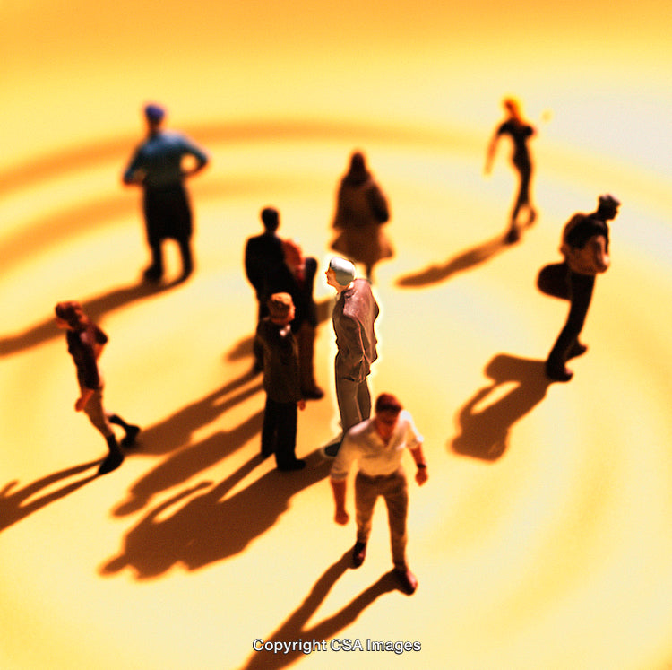 Group of Plastic Toy Miniatures Standing on Gradient Background