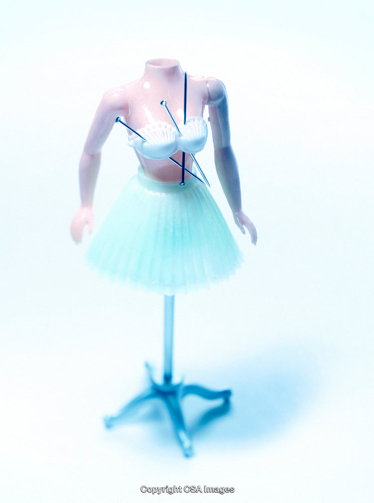 Surreal Concept with Pin-Pricked Mannequin in Pastel Color Design