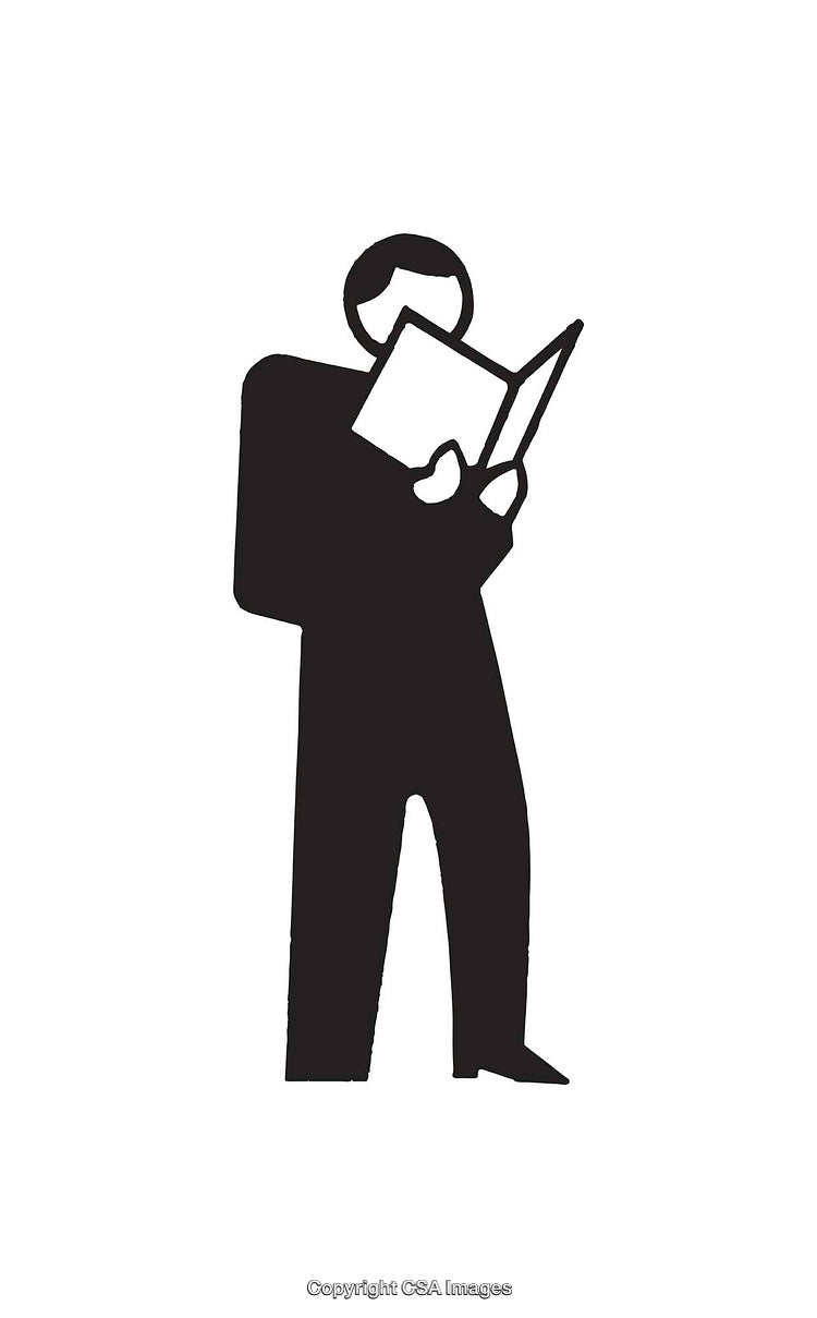 Silhouette of a Person Reading a Book in Black and White