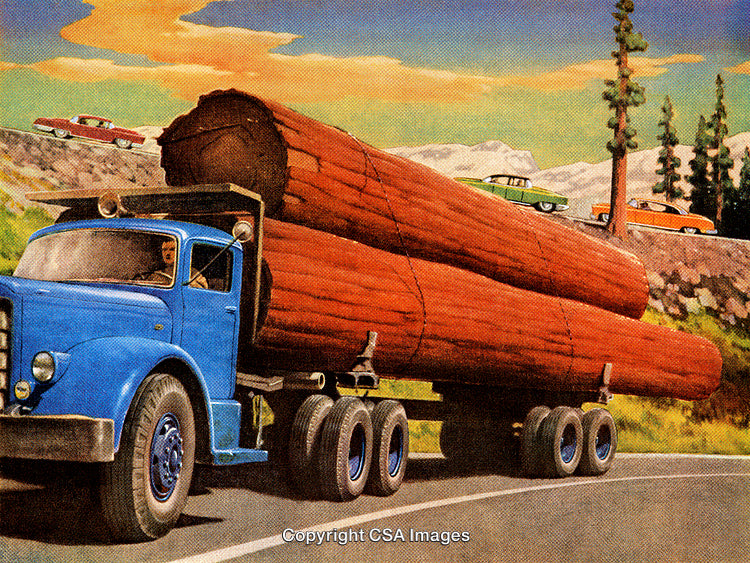 Blue Logging Truck on Mountainous Road Carrying Large Wooden Logs
