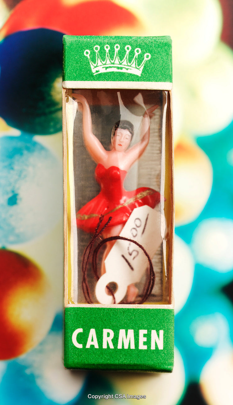 Colorful Package Featuring Miniature Carmen Figurine in Red Dress