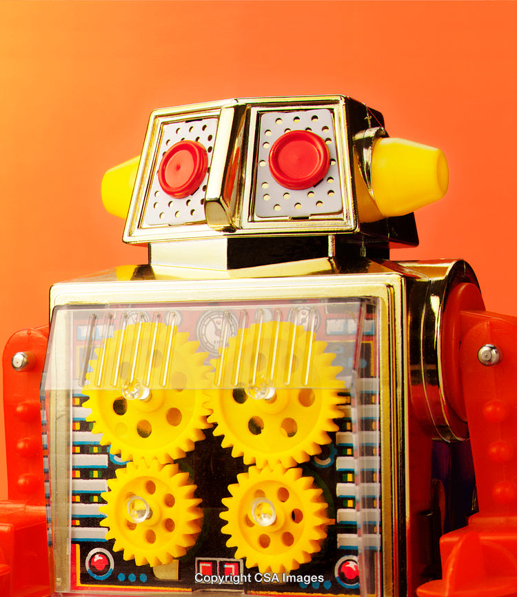Colorful Vintage Toy Robot With Gears on Bright Orange Background