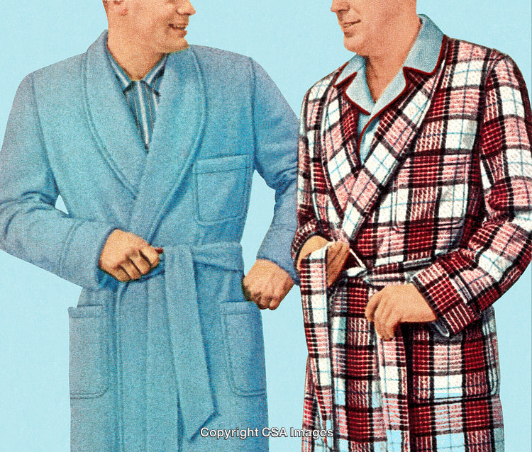 Two Men Wearing Stylish Bathrobes Engaging in a Friendly Conversation