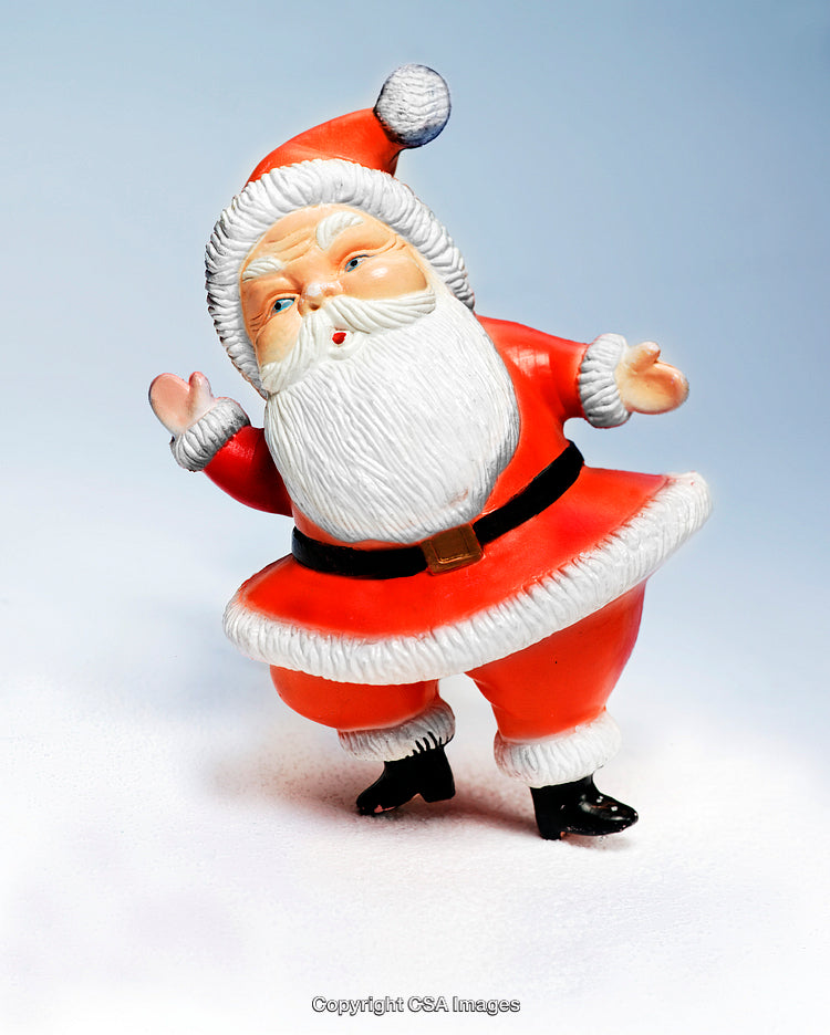 Santa Claus Figurine in Festive Red Outfit on White and Blue Background