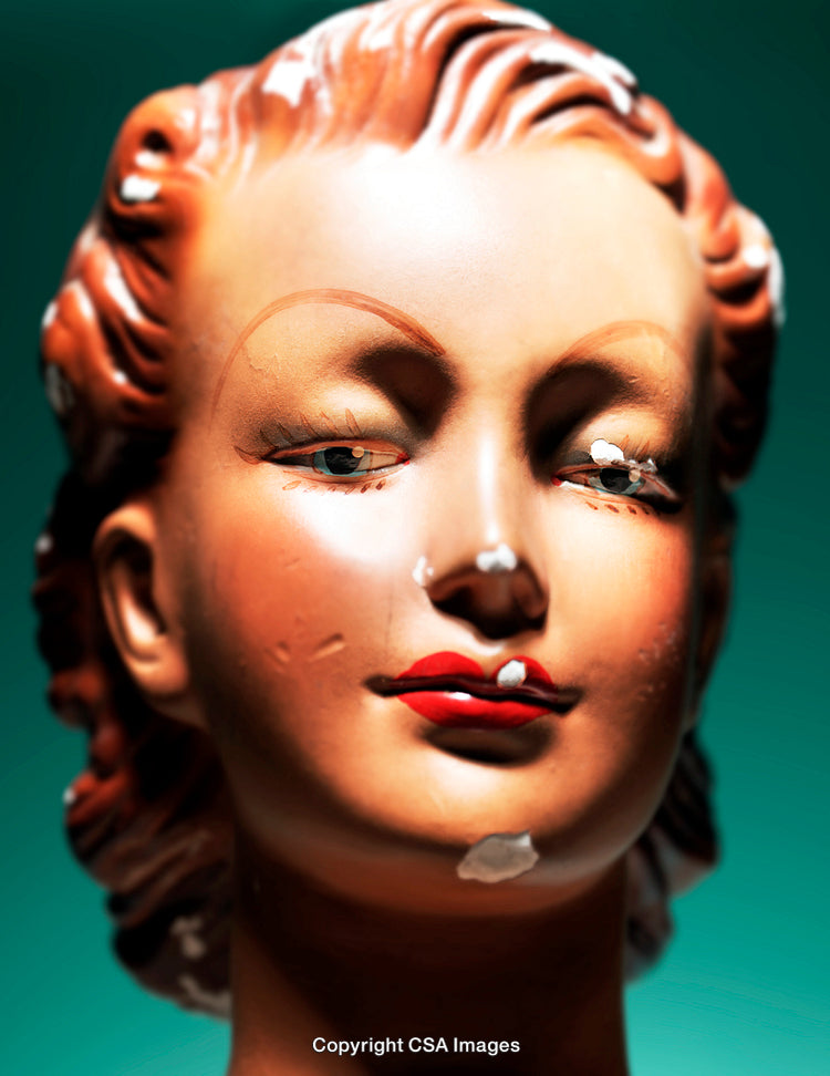 Close-Up of a Vintage Mannequin Head with Worn-Out Surface