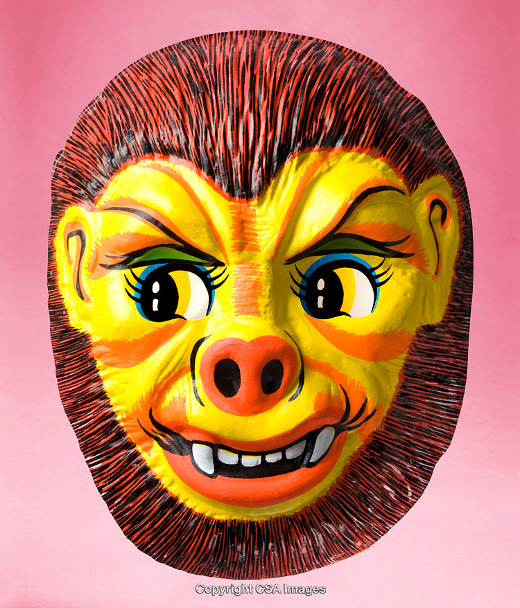 Vividly Colored Animal-Like Mask Set Against Bright Pink Background