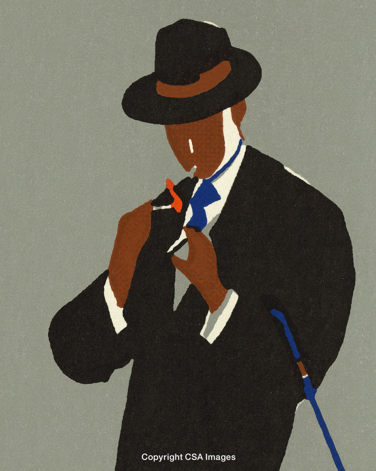 Man in Elegant Hat and Suit Striking a Stylish Pose with Cane